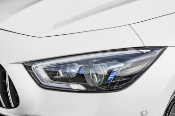 Mercedes-AMG GT 53 4MATIC+ 4-Door Coupé, AMG Night-packet, Exterior: Headlight, Exterior paint: designo diamond white bright