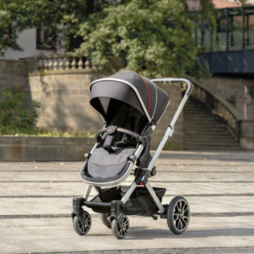 “DESSIN Sport” Infant Seat Carrier in black / anthracite / silver; AMG inspired 5-twin-spoke wheel design, air-chamber ed tyres and adjustable suspension.