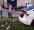 Tesla impaled by a guardrail